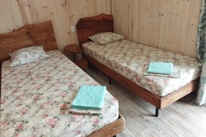 Спальня 4-местного семейного номера — гостиница АльДэн